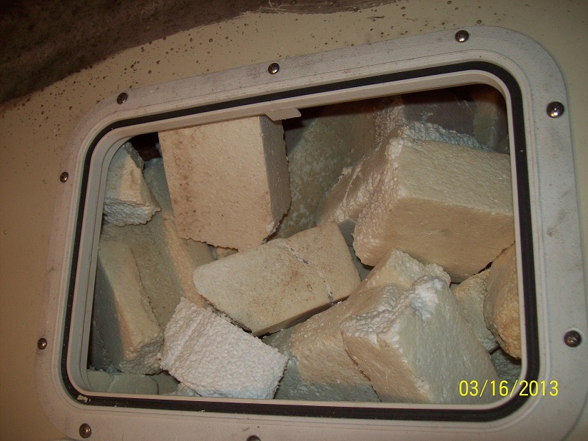 Forward bulkhead hatch_and foam chunks_a.jpg